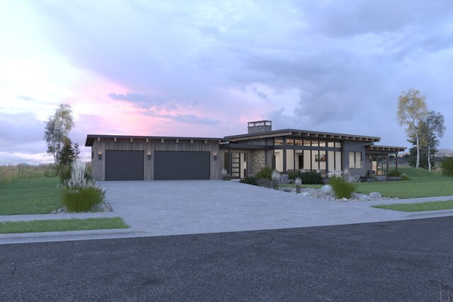 10580 Royal Coachman Dr, Missoula, MT 59808 - view of front of house featuring a yard and a garage