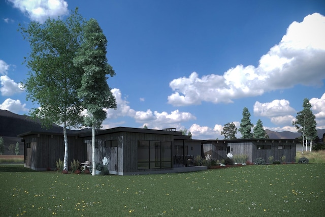 10580 Royal Coachman Dr, Missoula, MT 59808 - back of property featuring a yard