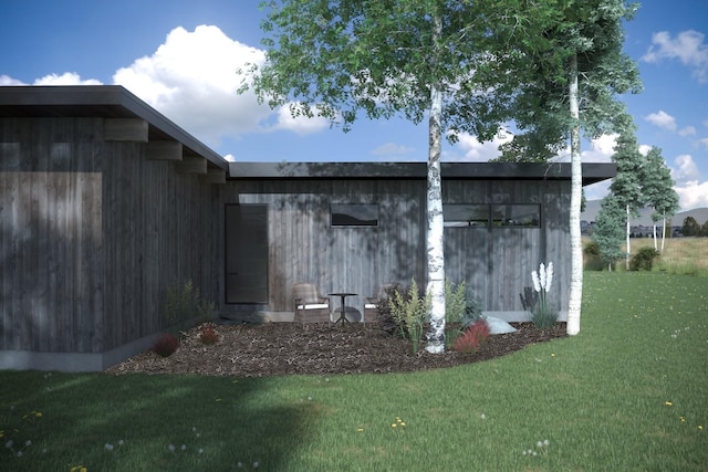 10580 Royal Coachman Dr, Missoula, MT 59808 - view of outdoor structure with a lawn