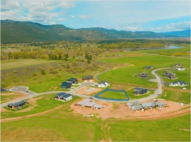 10580 Royal Coachman Dr, Missoula, MT 59808 - drone / aerial view featuring a rural view and a water and mountain view
