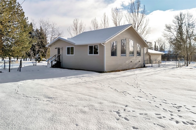 view of snow covered property