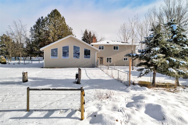 view of snow covered property