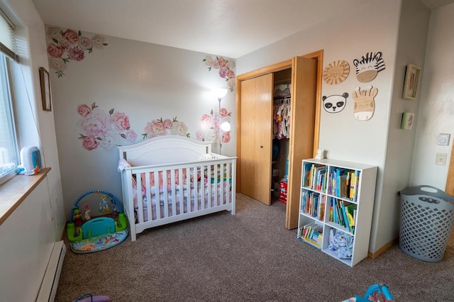 carpeted bedroom featuring a closet, multiple windows, a baseboard radiator, and a nursery area