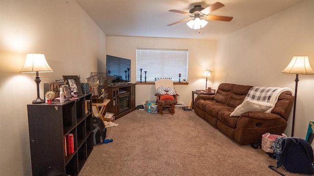 living room featuring light carpet and ceiling fan