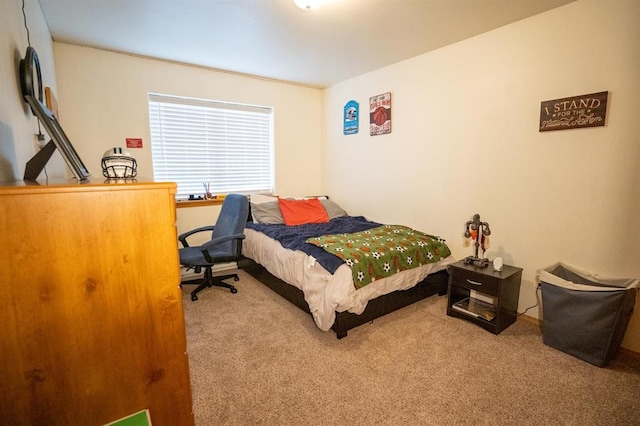 bedroom with light colored carpet