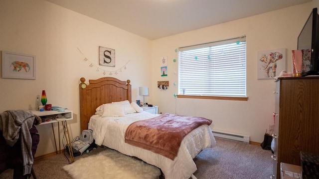 bedroom with carpet and a baseboard radiator