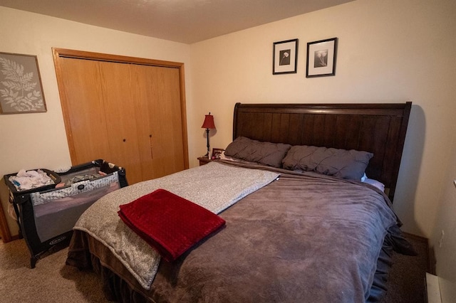 bedroom featuring carpet and a closet