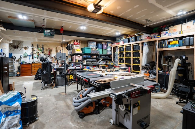 garage featuring a workshop area and a garage door opener