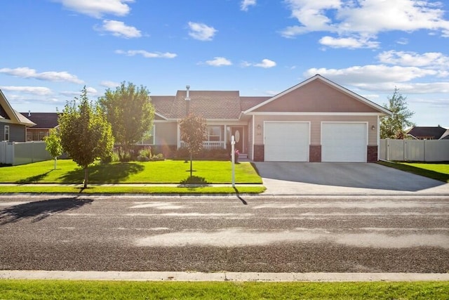 single story home featuring a garage, brick siding, fence, driveway, and a front lawn