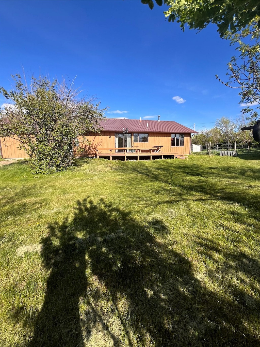 view of yard with a deck