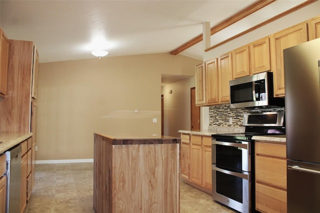 15 Sully Rd, Plains, MT 59859 - kitchen featuring stainless steel appliances, light brown cabinetry, a center island, decorative backsplash, and light countertops
