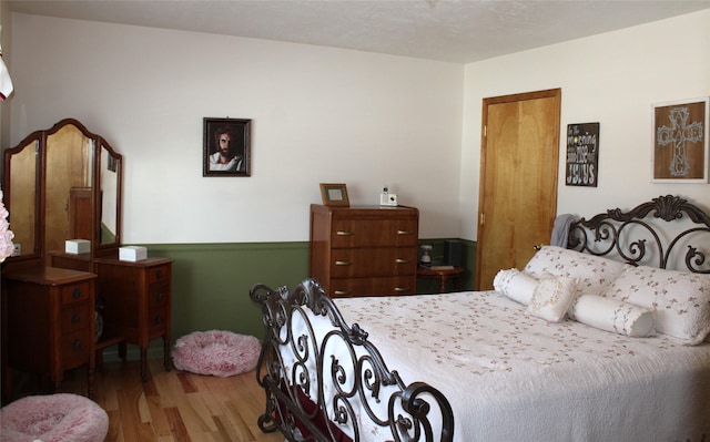 bedroom featuring hardwood / wood-style floors