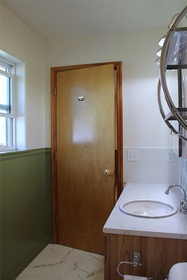 15 Sully Rd, Plains, MT 59859 - bathroom featuring a sink and marble look tile flooring