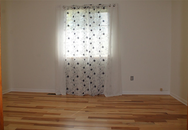 15 Sully Rd, Plains, MT 59859 - unfurnished room with wood finished floors and baseboards