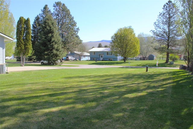 15 Sully Rd, Plains, MT 59859 - view of grassy yard featuring a mountain view