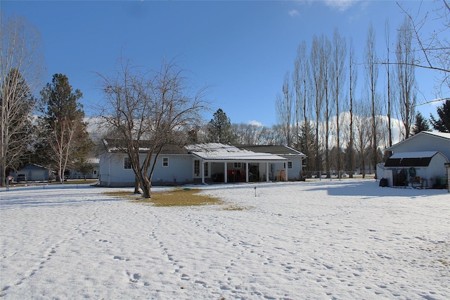 view of snow covered property