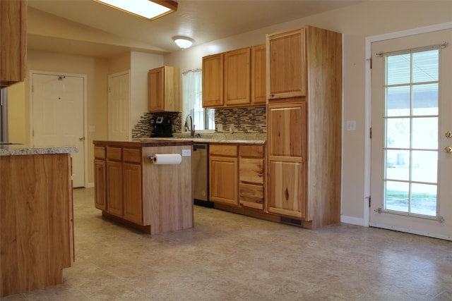 15 Sully Rd, Plains, MT 59859 - kitchen with dishwasher, tasteful backsplash, a kitchen island, baseboards, and a sink