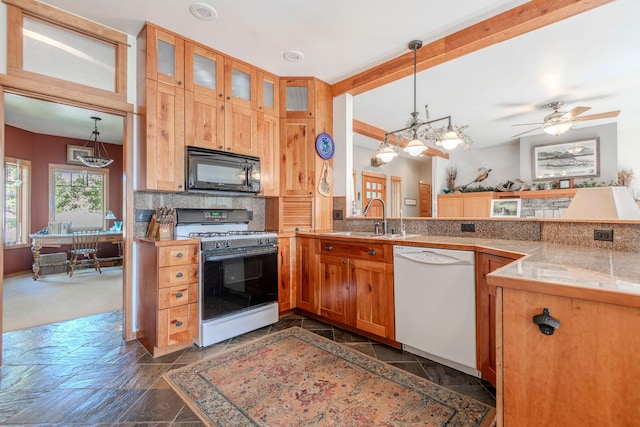 kitchen featuring decorative light fixtures, white appliances, tasteful backsplash, and ceiling fan