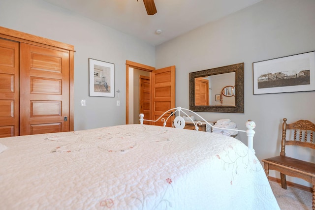 bedroom featuring ceiling fan, carpet floors, and a closet