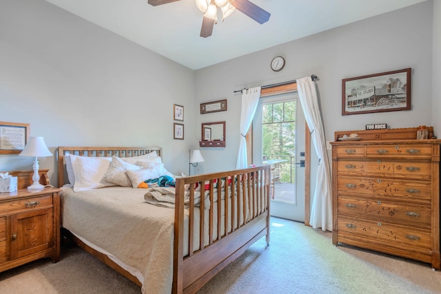 bedroom with ceiling fan, access to exterior, and light carpet