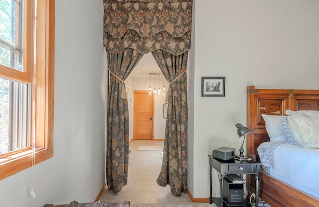 bedroom with light carpet