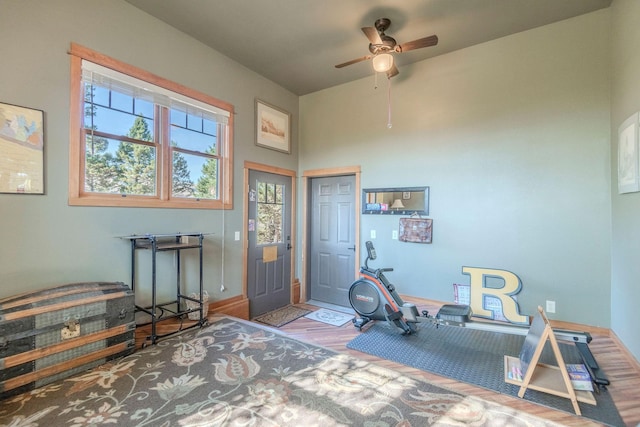 bedroom featuring a closet, hardwood / wood-style flooring, and ceiling fan