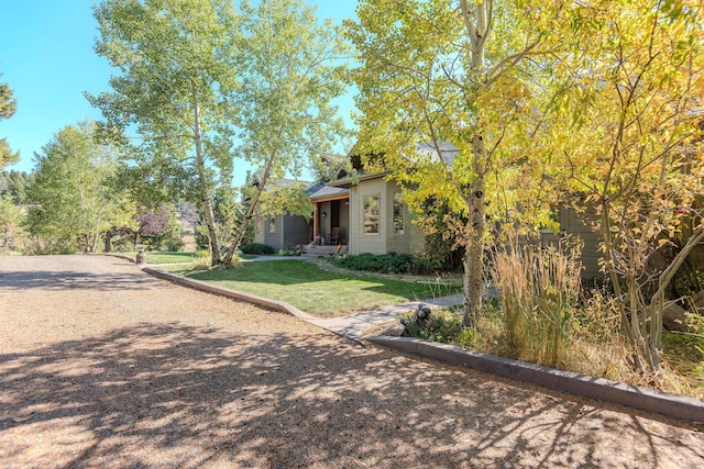 view of front of home with a front yard