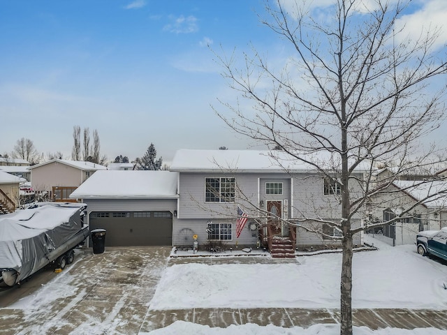 split foyer home featuring a garage