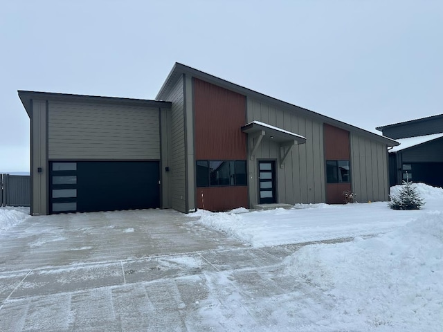 view of snow covered garage