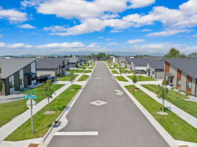 3416 Goldenrod Ln, Kalispell, MT 59901 - view of asphalt road with a residential view and sidewalks