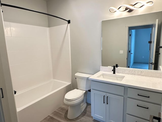 3416 Goldenrod Ln, Kalispell, MT 59901 - bathroom with vanity, bathing tub / shower combination, and wood finished floors