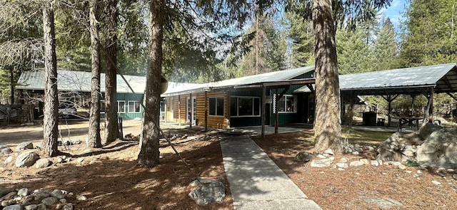 27 Birch Ln, Trout Creek, MT 59874 - view of front of property with a patio area and metal roof