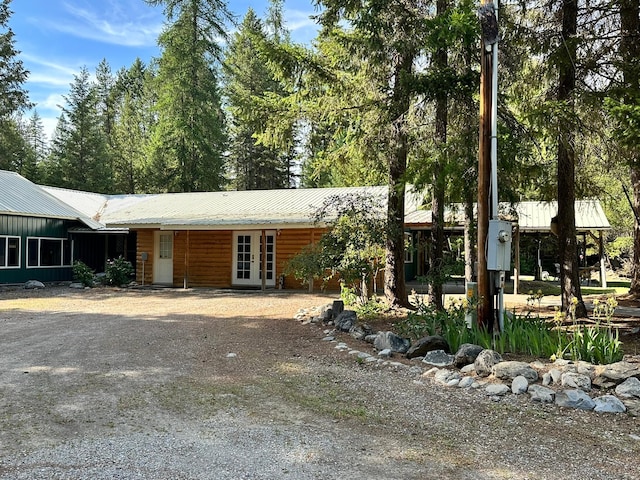 27 Birch Ln, Trout Creek, MT 59874 - ranch-style home featuring french doors and metal roof