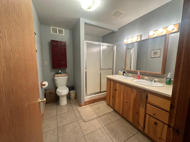 27 Birch Ln, Trout Creek, MT 59874 - bathroom featuring a sink, toilet, a shower stall, and visible vents