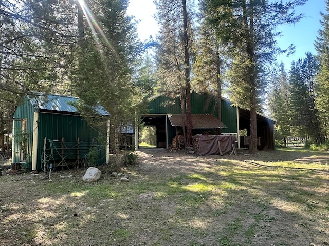 27 Birch Ln, Trout Creek, MT 59874 - view of yard with a pole building and an outdoor structure