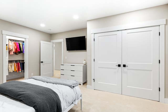 bedroom with light colored carpet