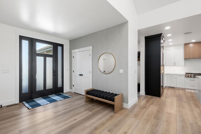 entrance foyer featuring light wood-type flooring