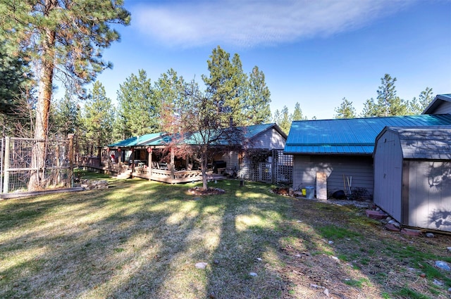 view of yard featuring a gazebo and a storage shed