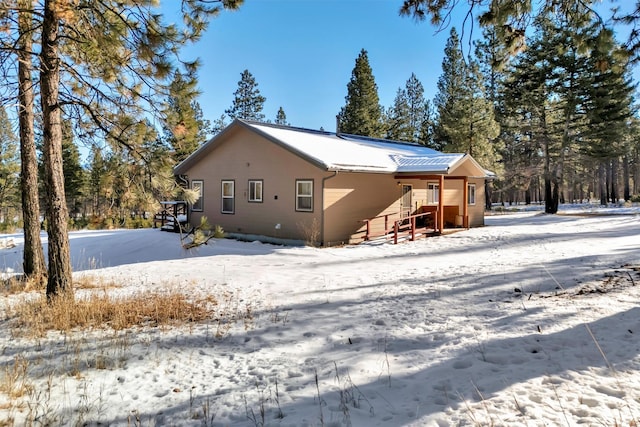 view of snow covered property