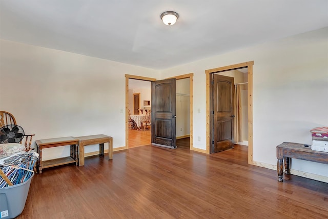 bedroom featuring dark wood-type flooring