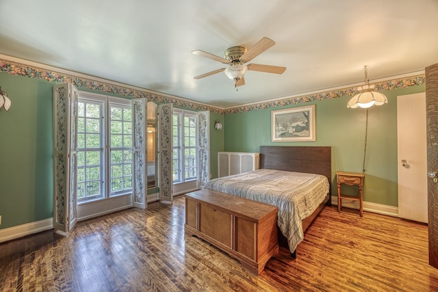 bedroom featuring ceiling fan and hardwood / wood-style floors