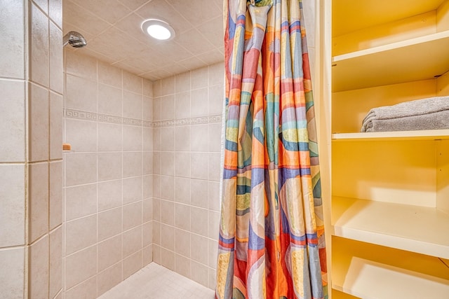 bathroom with a shower with shower curtain