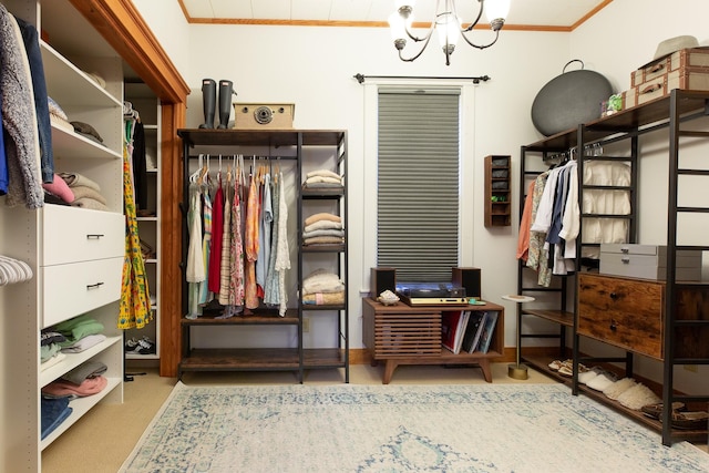 spacious closet with a notable chandelier