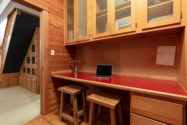 bar featuring wood walls