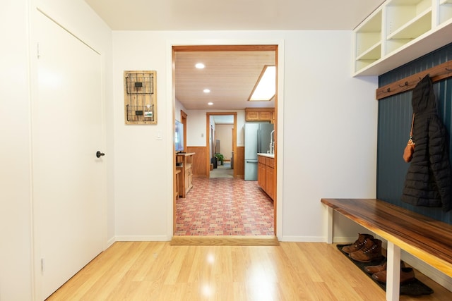 mudroom with light wood-type flooring