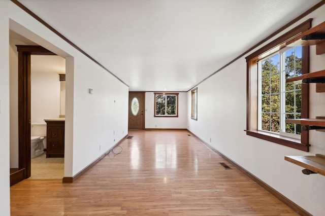 633 Kalispell Ave, Whitefish, MT 59937 - spare room with light wood-style flooring and healthy amount of natural light