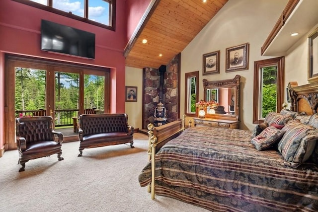 940 Mccaffery Rd, Bigfork, MT 59911 - carpeted bedroom with high vaulted ceiling, access to exterior, wooden ceiling, and recessed lighting