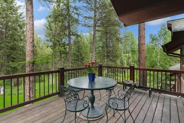 940 Mccaffery Rd, Bigfork, MT 59911 - wooden terrace featuring outdoor dining space