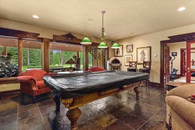 940 Mccaffery Rd, Bigfork, MT 59911 - recreation room featuring recessed lighting, a textured ceiling, and billiards