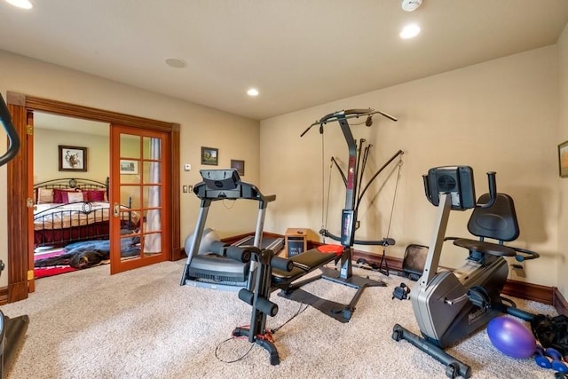 940 Mccaffery Rd, Bigfork, MT 59911 - workout area featuring carpet floors, recessed lighting, and french doors